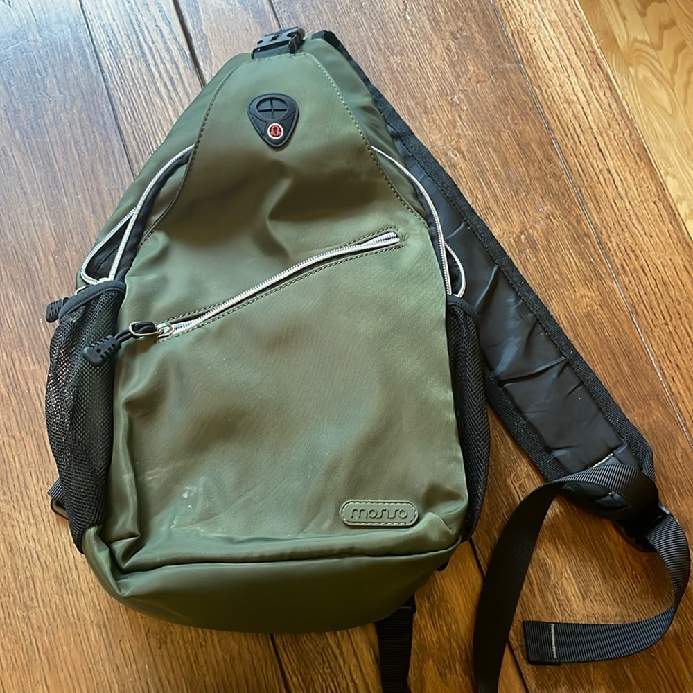 Misiso - sling backpack. Perfect for travel took it to Rome. RDFI blocker.